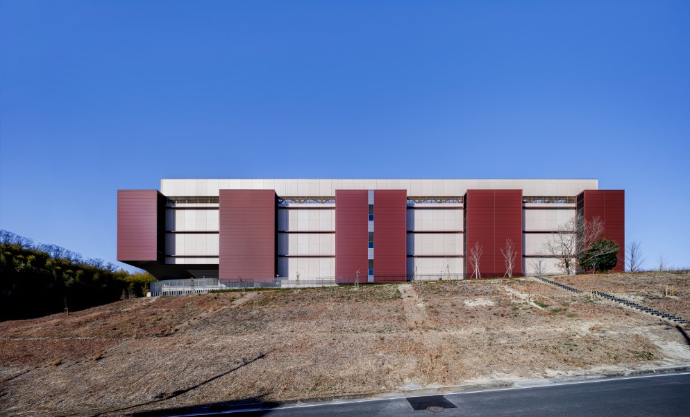 OSK11 east elevation, credited exterior photograph from NTT Facilities architectural portfolio; capture date undisclosed.